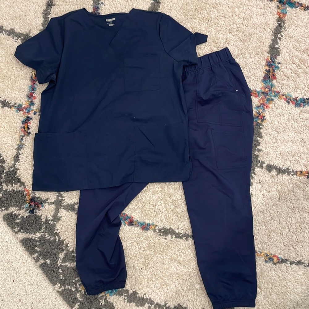 Two piece scrub star navy blue hospital uniform. Scrubs with multiple pockets